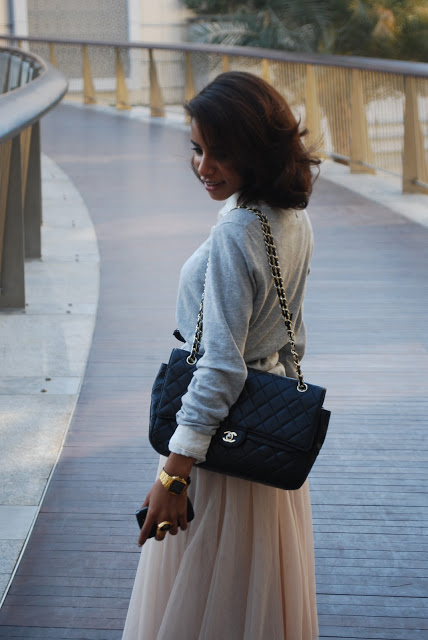 Vivian with one of our Classic Chanel bags, ETOILE LUXURY VINTAGE